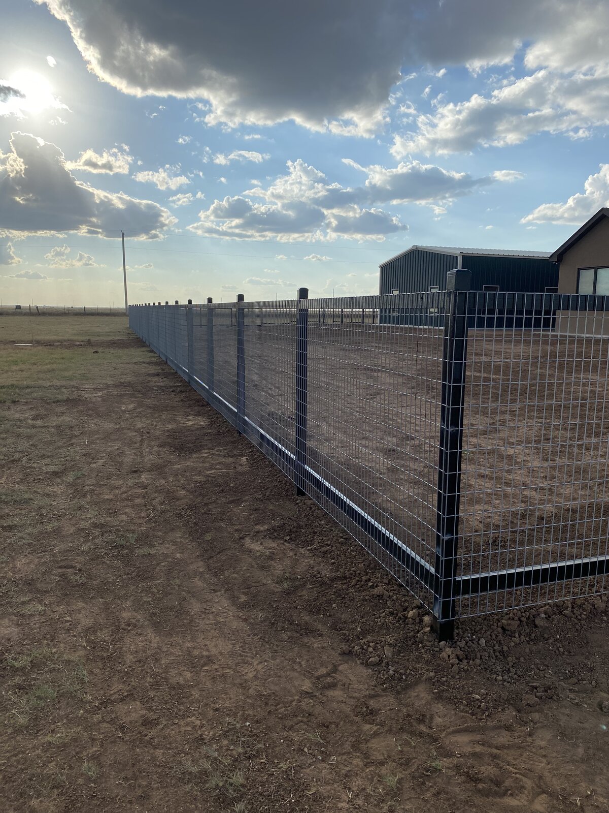 Long-run welded wire fence on rural acreage in Canyon, TX