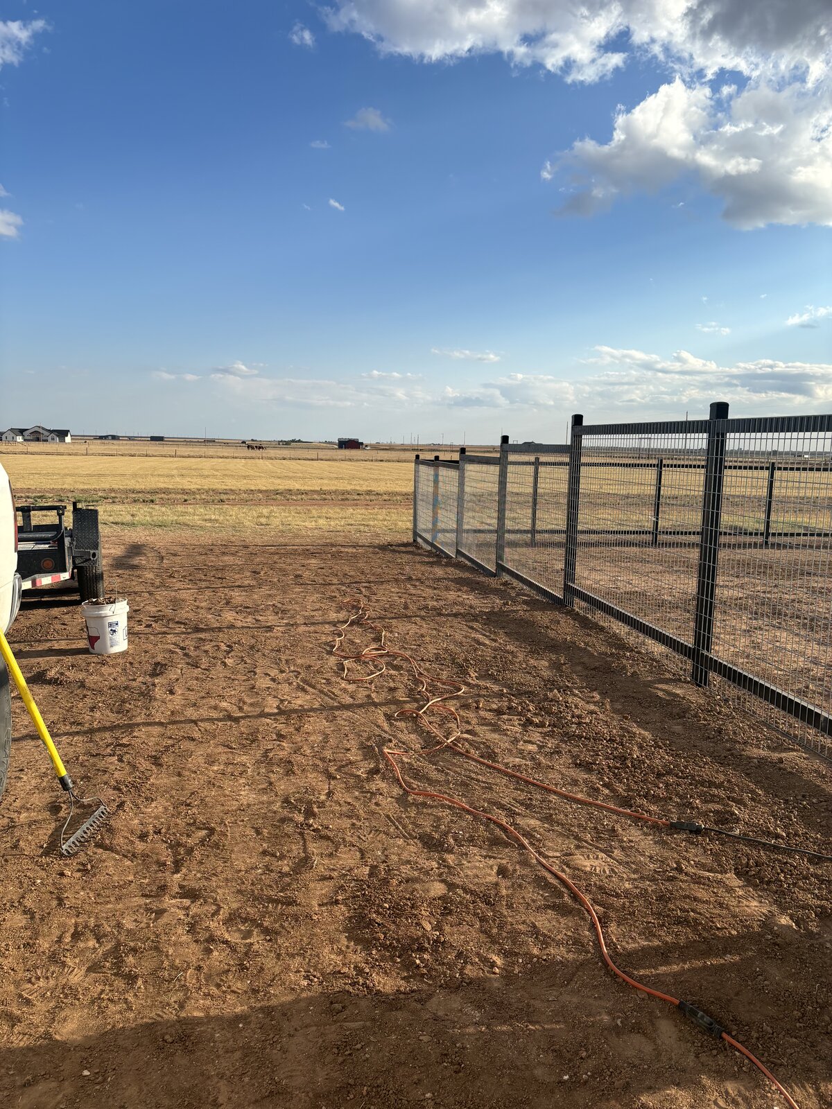 Wire fence job-site installation in progress in Bushland, TX