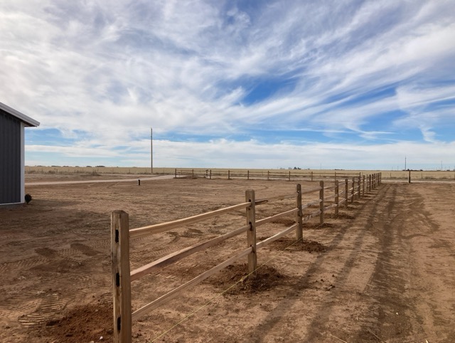 Cedar split-rail ranch fence on Texas Panhandle acreage